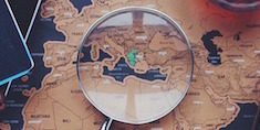 magnifying glass and map